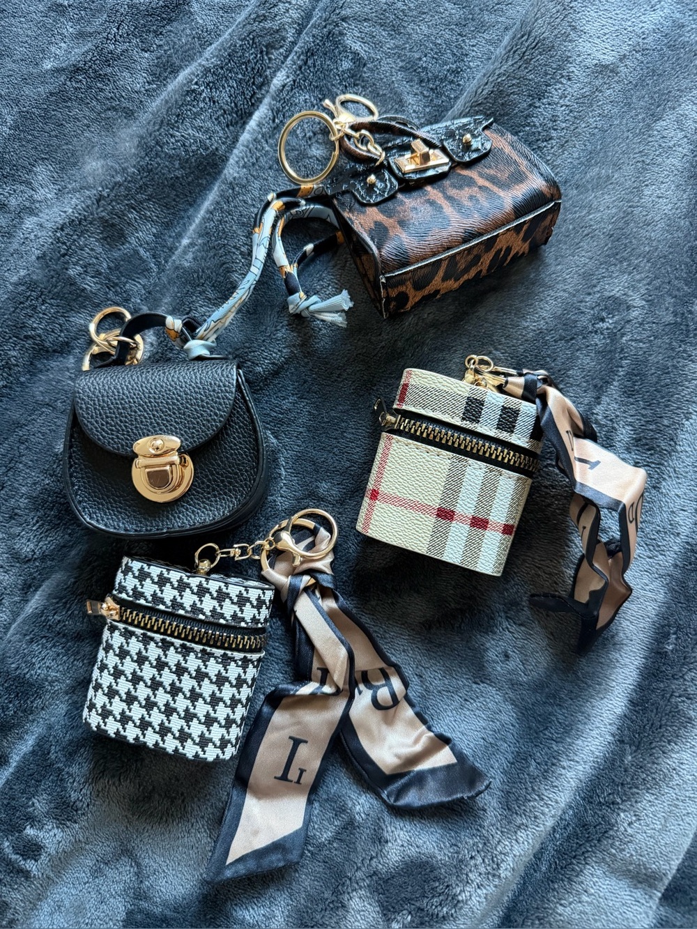 4 NEW bagcharm keychain earbud holders